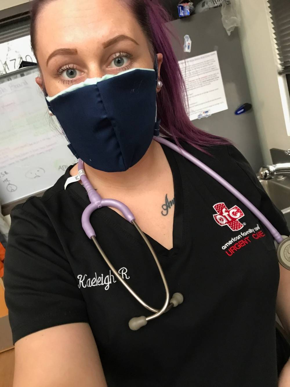 A healthcare professional wearing a mask made by PCEC volunteers